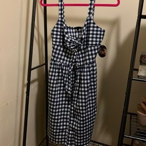 Blue plaid cotton dress. Bow in front. NWT
